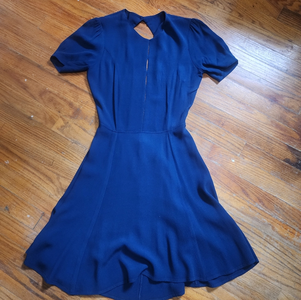 Reformation dress in blue with open back.  Size 6